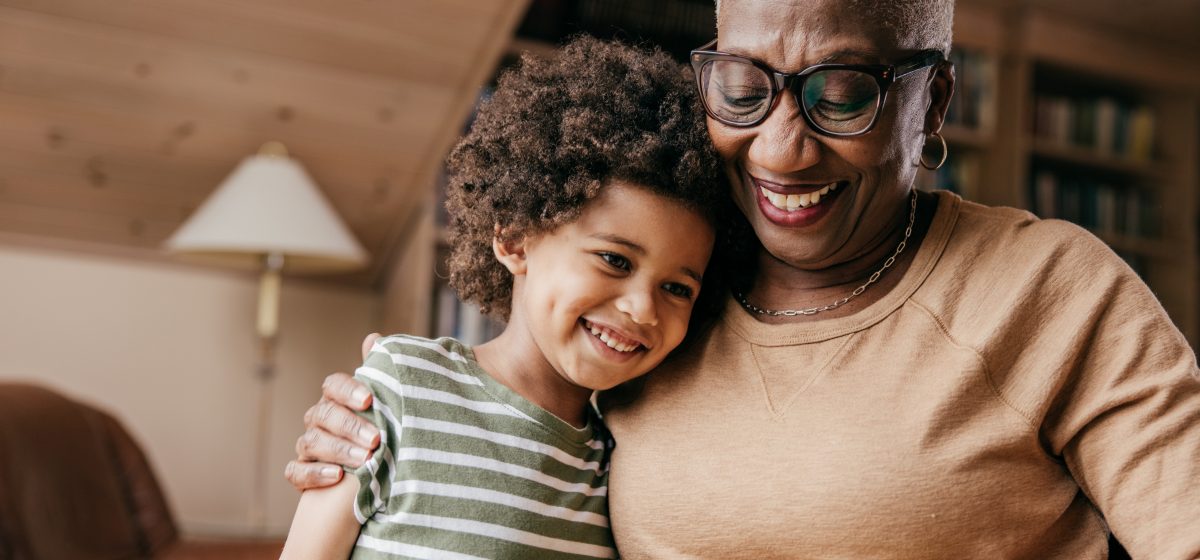 grandmother and grandchild hugging